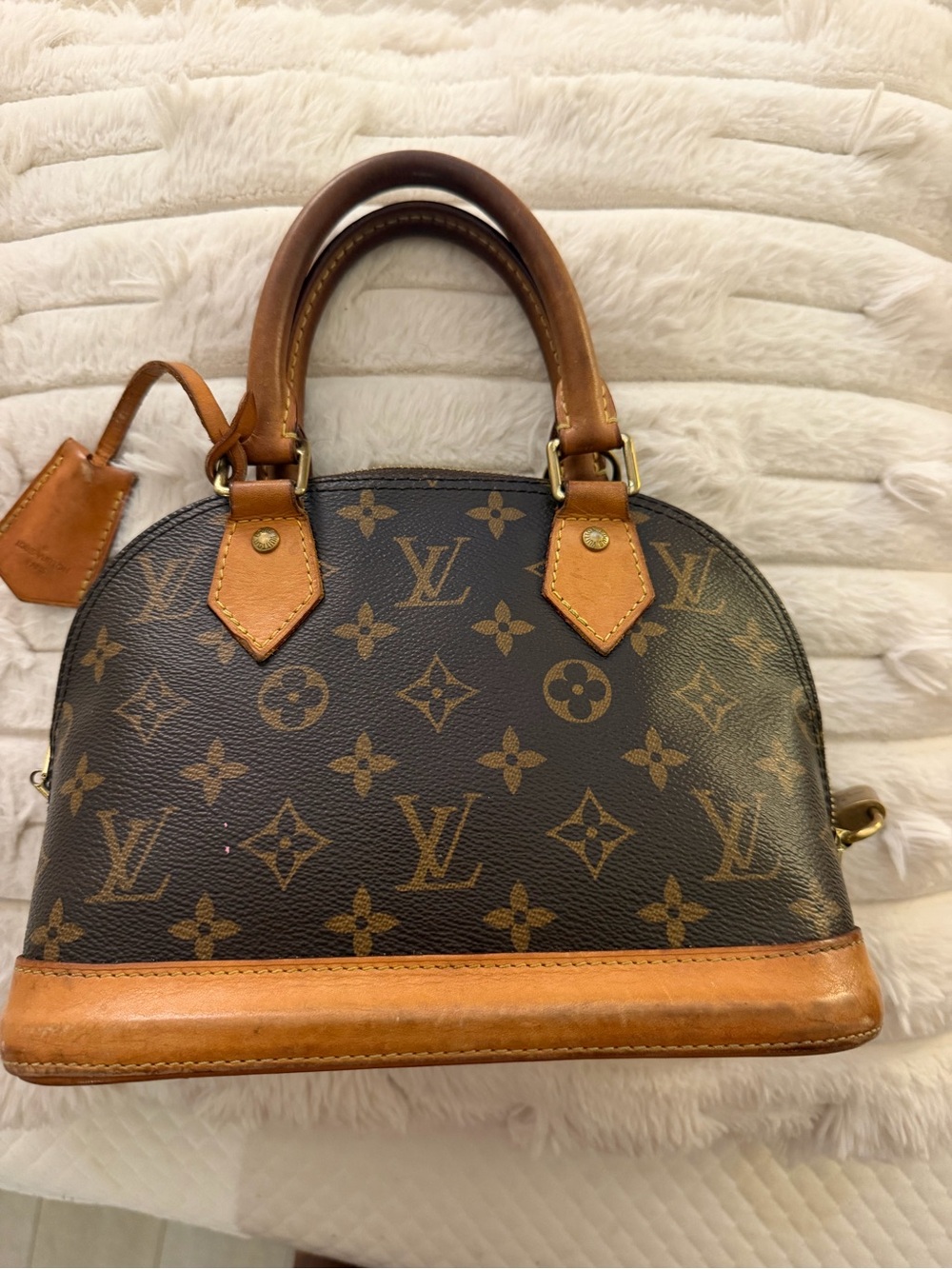 Louis Vuitton Monogram Alma PM Satchel in Brown and Tan